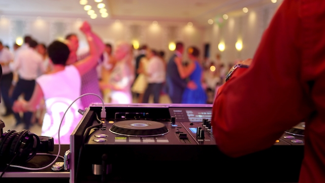 Dancing the Night Away: Unveiling the Secrets to an Epic Wedding DJ Experience
